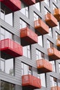 Bright balconies in modern high-rise building with avant-garde a Royalty Free Stock Photo
