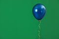 Bright balloon on color background. Celebration time
