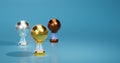 Bright Basketball Gold Silver and Bronze Trophies with a soft light background Royalty Free Stock Photo