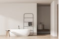 Bright bathroom interior with empty wall, bathtub, towel, sink Royalty Free Stock Photo