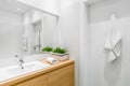 Bathroom with white structural tiles Royalty Free Stock Photo