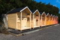 Bright beach huts in a row