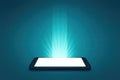 A bright beam of light emanating from a smartphone screen and a digital connection evoke themes of innovation and futuristic Royalty Free Stock Photo