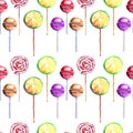 Bright beautiful colorful wonderful delicious tasty yummy summer fresh dessert lemon twisted caramel candies on a sticks vertical