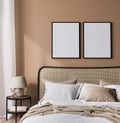 Bright bedroom mockup, rattan wooden bed in a beige background, black frame mock up in a neutral colors room interior