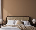 Bright bedroom mockup, rattan wooden bed in a beige background, wall mock up in a neutral colors room interior