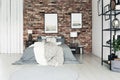 Simple bedroom with brick wall Royalty Free Stock Photo