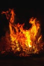 Bright big bonfire at night, forks of flame Royalty Free Stock Photo