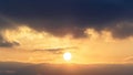 Bright big sun on the sky with yellow orange gradient colors, beautiful sunset cloudy sky Royalty Free Stock Photo