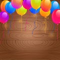 Bright Birthday Balloons on Wooden Background Royalty Free Stock Photo