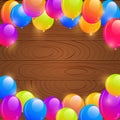 Bright Birthday Balloons on Wooden Background Royalty Free Stock Photo