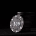 Bright black poker chips on a dark background closeup Royalty Free Stock Photo