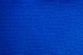 Bright blue color textile fabric surface close up macro texture background