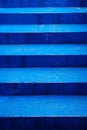 Bright blue concrete painted staircase close up Royalty Free Stock Photo