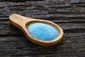 Bright blue copper sulfate in a spoon - Blue sea salt Royalty Free Stock Photo