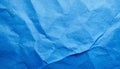 Bright blue crumbled paper texture background Royalty Free Stock Photo