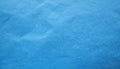 Bright blue crumbled paper texture background Royalty Free Stock Photo