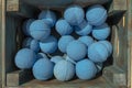 Bright blue effervescent balls for the bathroom in a wooden box on the market, top view