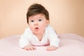 Bright blue eyed 6 month old baby girl Royalty Free Stock Photo