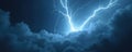Bright blue lightning strikes through dark stormy clouds. Electrical discharge illuminates the stormy sky with a powerful burst. Royalty Free Stock Photo