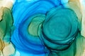 Bright blue and ocher colorful watercolor background. Hand drawn sky blue and green brush strokes, blobs, waves, layers gradient.