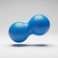 Blue Peanut Shaped Massage Ball Floating Against a Light Gray Background therapy Royalty Free Stock Photo