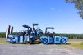Bright blue road maintenance machinery