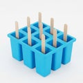 A Blue Popsicle Mold with Wooden Sticks on a White Background ice pop maker frozen treats Royalty Free Stock Photo