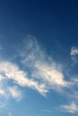 Bright blue skies with puffy cloud cover and bright sunlight Royalty Free Stock Photo