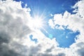 Bright blue sky with clouds and sun rays Royalty Free Stock Photo