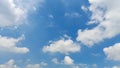 bright blue sky with clouds, sunny day