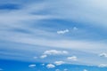 Bright blue sky with Cumulus and stratified clouds