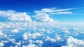 Bright blue sky with curly clouds Daylight background. Royalty Free Stock Photo