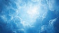 Bright Blue Sky with Fluffy Clouds and Glowing Light Royalty Free Stock Photo