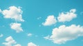 Bright Blue Sky with Fluffy White Cumulus Clouds on a Sunny Day, Evoking Tranquility and Peace Royalty Free Stock Photo