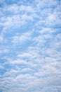 Bright blue sky with light feather white clouds Royalty Free Stock Photo