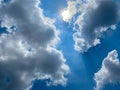 Bright blue sky That light shines down with power With clouds that are overcast. Royalty Free Stock Photo