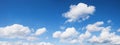 Bright blue sky panorama with white cumulus clouds Royalty Free Stock Photo
