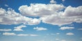 Bright blue sky with puffy clouds over Moab Utah Royalty Free Stock Photo
