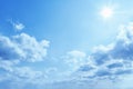 bright blue sky with sun and clouds background Royalty Free Stock Photo