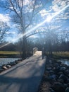 Bright Sunbeam over Path and Bridge