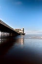 Bright blue sky on Weston Super Mare beach with pier, somerset, UK Royalty Free Stock Photo