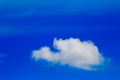 Bright blue sky with white clouds