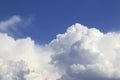 Bright blue sky with white soft clouds