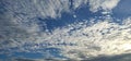 Bright blue with small clouds floating sky looks beautiful Royalty Free Stock Photo