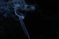 Blue Smoke Against Black Background Royalty Free Stock Photo