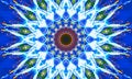 Bright blue star-shaped mandala Art Royalty Free Stock Photo