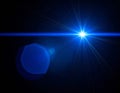 Bright Blue Starburst Light Effect on Dark Background Royalty Free Stock Photo