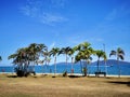 Bright blue sunny sky above with beautiful ocean view. Royalty Free Stock Photo