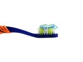 A bright blue toothbrush and toothpaste. Isolate. Dentistry and healthcare concept